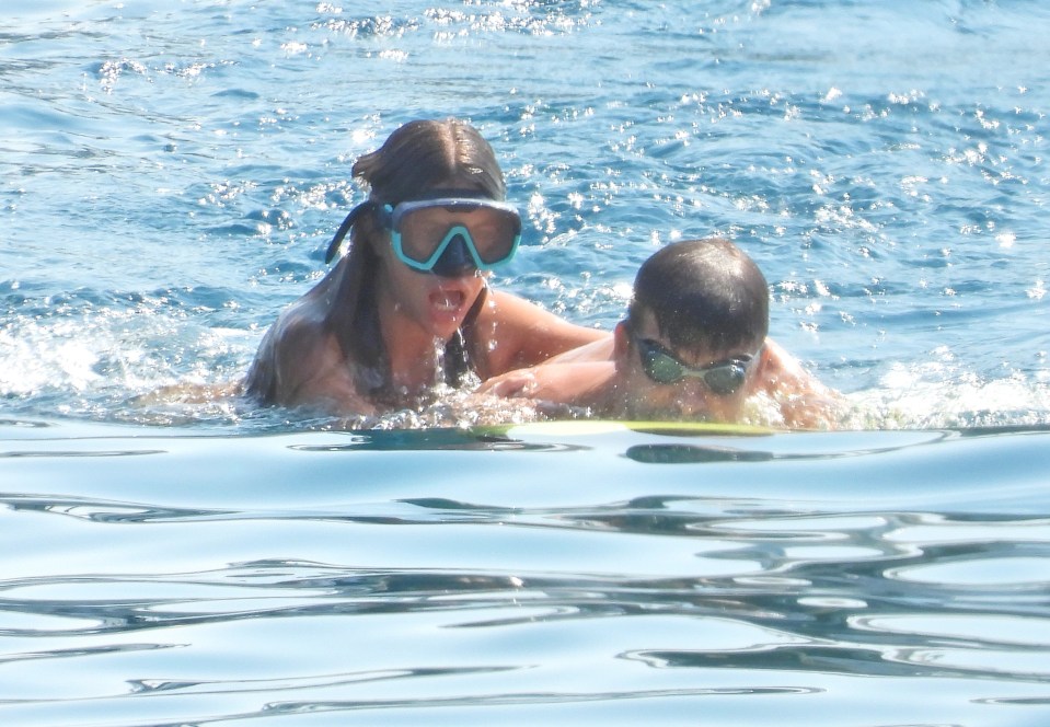 The couple took a dive while wearing swimming goggles