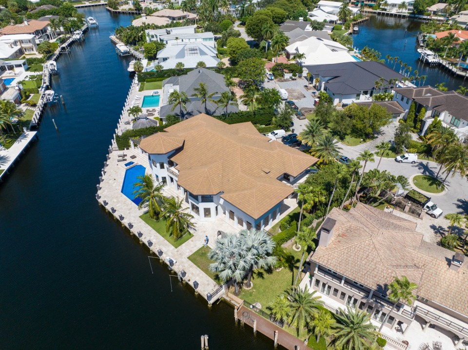 The waterfront house is fitted with amenities such as a pool, spa and boat docks