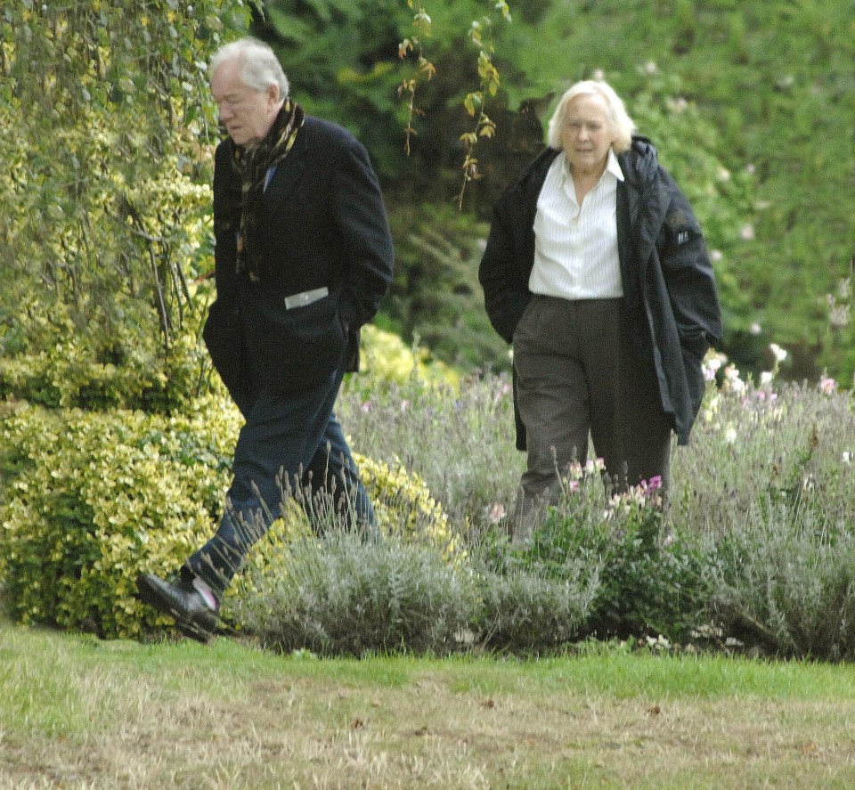 Sir Michael and Lady Anne Gambon walking in the garden of their home in Gravesend, Kent, in 2008