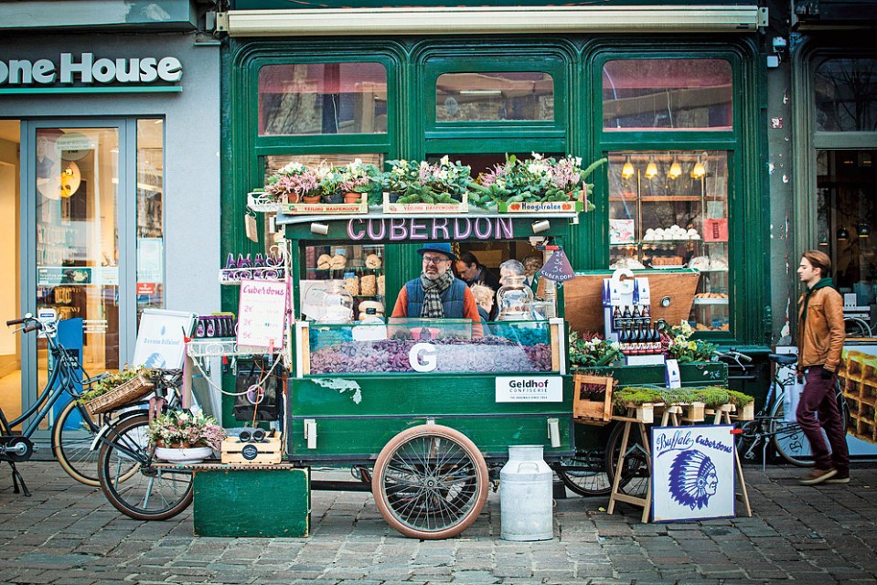 You can grab some cuberdons - Belgium's famous cone-shaped, chewy raspberry-flavoured sweets with gooey centres - in the small square of Groentenmarkt