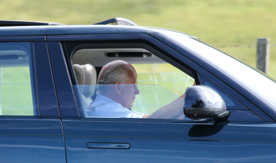 Charles and Camilla chose to stay overnight at Balmoral Castle to mark one year since the Queen's death, pictured the King driving yesterday