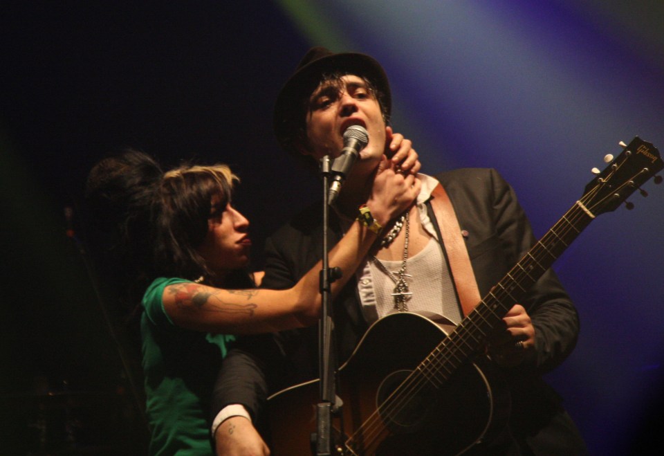 Amy Winehouse joins Pete Doherty on stage at his headline slot at the V festival in Chelmsford in 2009