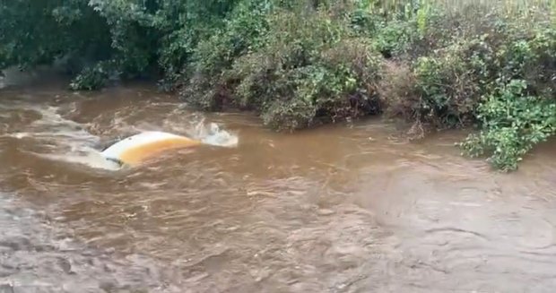 In Co Derry, Northern Ireland, firefighters had to rescue a woman after her car became submerged in Storm Agnes flood waters