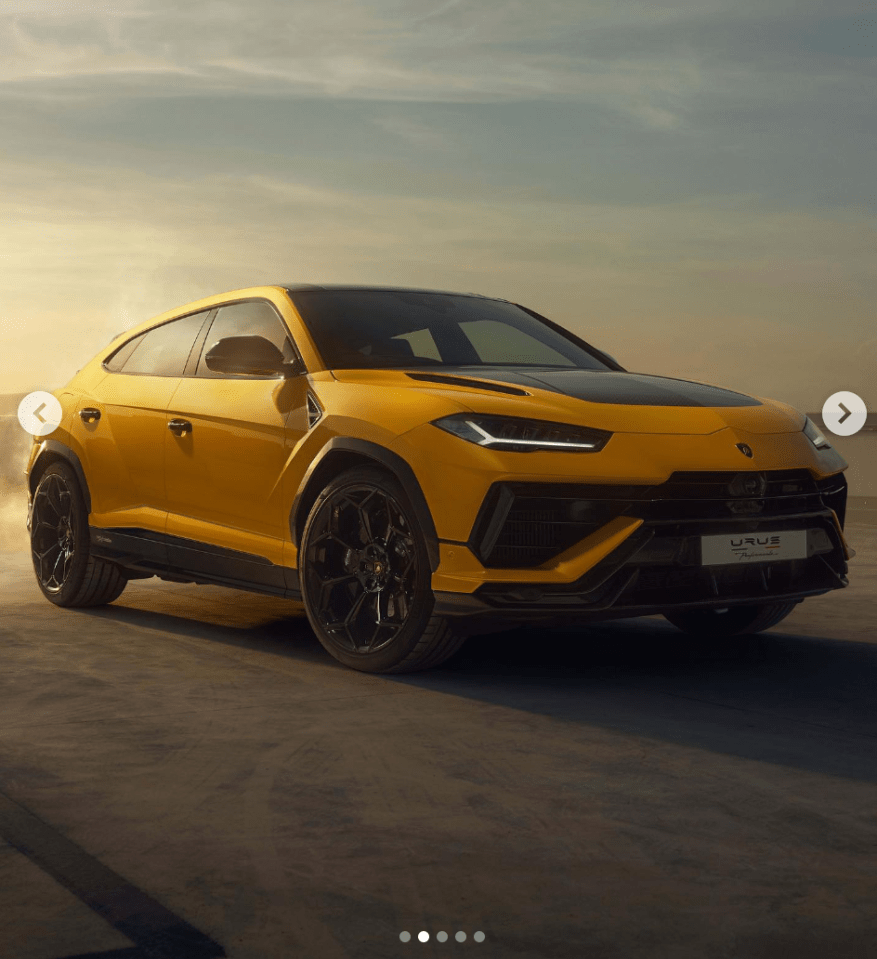 a yellow lamborghini urus is parked in a parking lot