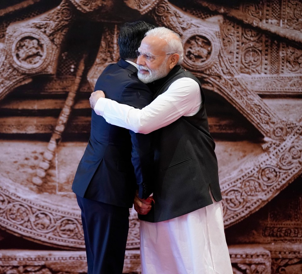 The leaders bearhugged after agreeing to do a post-Brexit trade deal at the summit