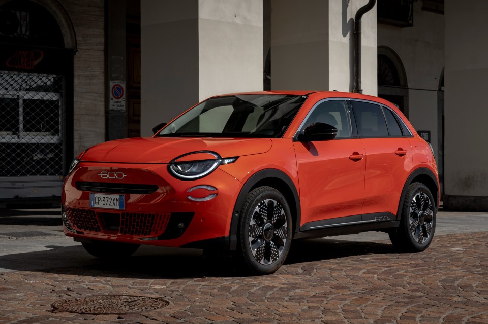 As its cheery smile and bug-eye headlamps tell you, this new Fiat 600e is a bigger brother to the 500