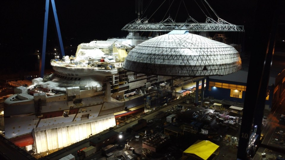 Made of steel and 600 panels of glass, workers had to be incredibly careful when installing it on to the ship