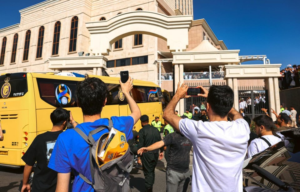 Fans flocked around the bus hoping to see big names like Ronaldo