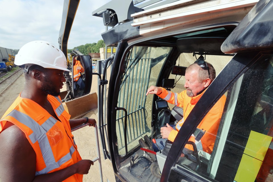 Kevin boards a crane and inspects equipment worth hundreds of thousands