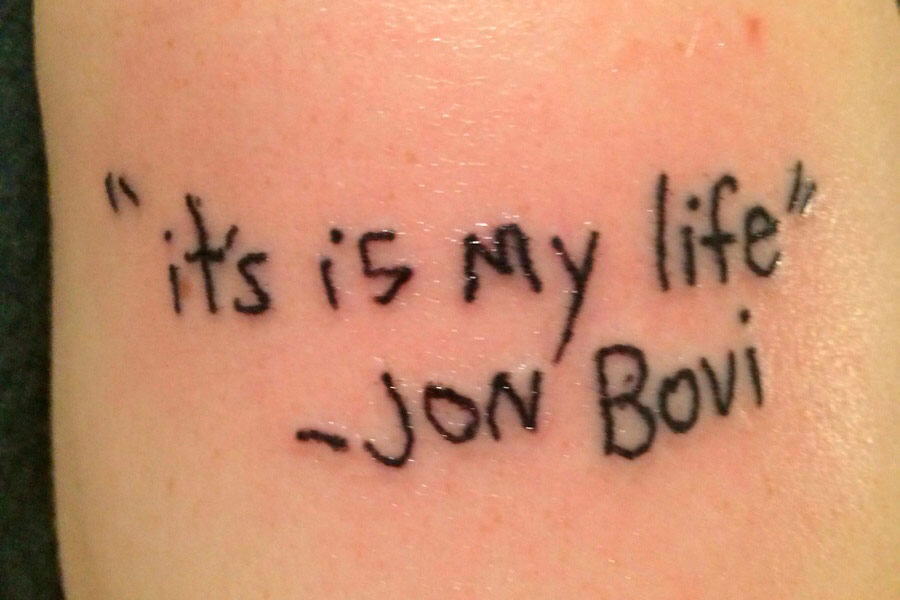 This tattoo shows the wrong lyrics AND artist name