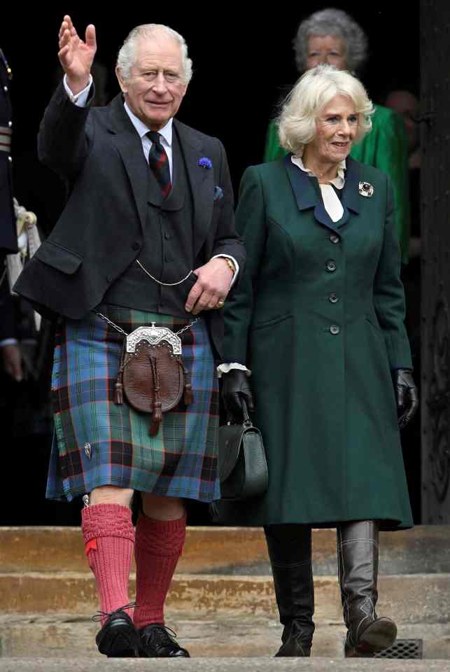 King Charles - pictured here with Camilla - released the photograph as a ­tribute to mark the first anniversary of his mother's passing