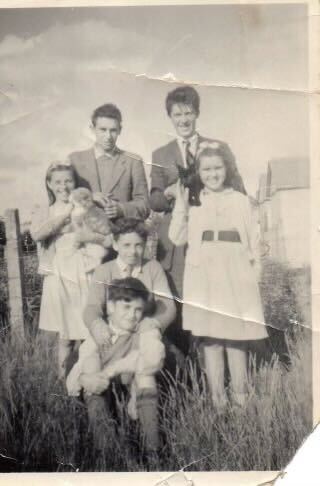 Carole (left) pictured with her brothers and sister Elizabeth (far right)