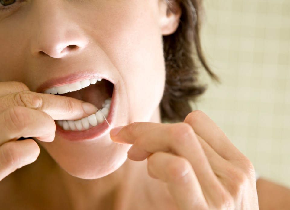 Not flossing daily could put you at increased risk of health problems, a dentist has warned