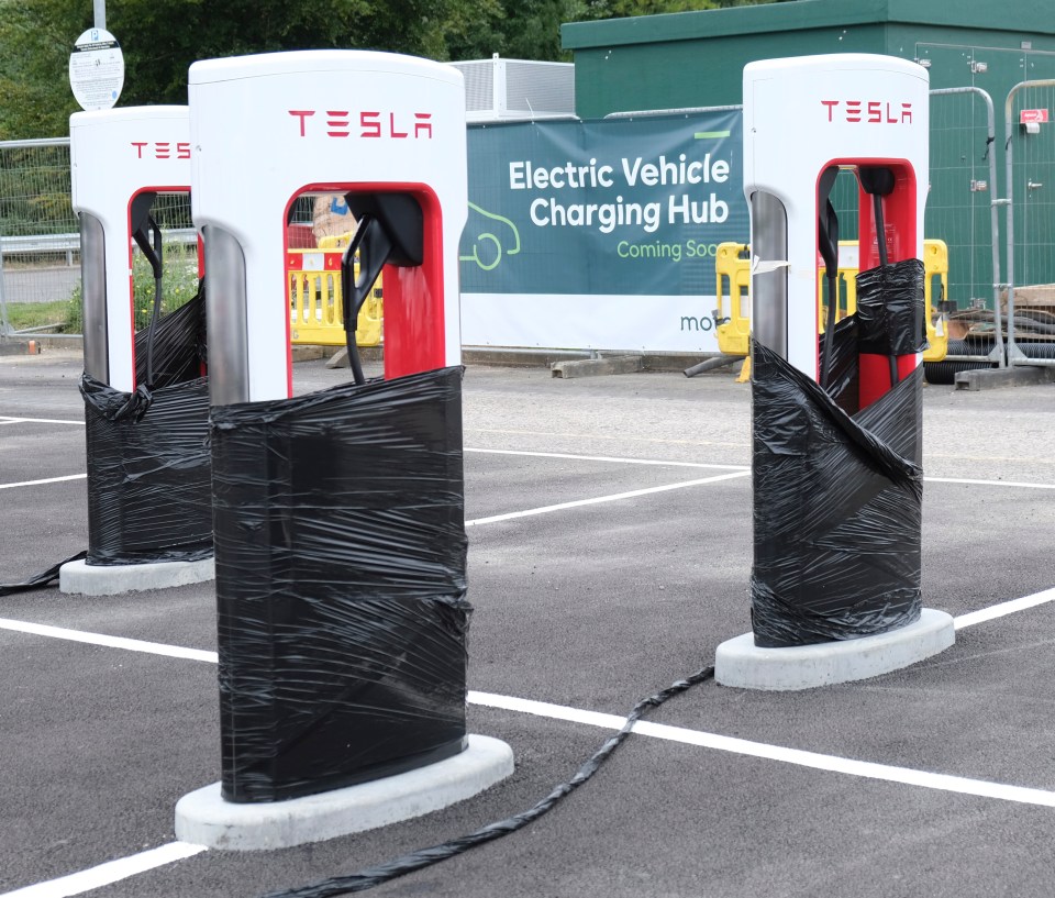 EV car charge points taped up at Medway Services in Kent