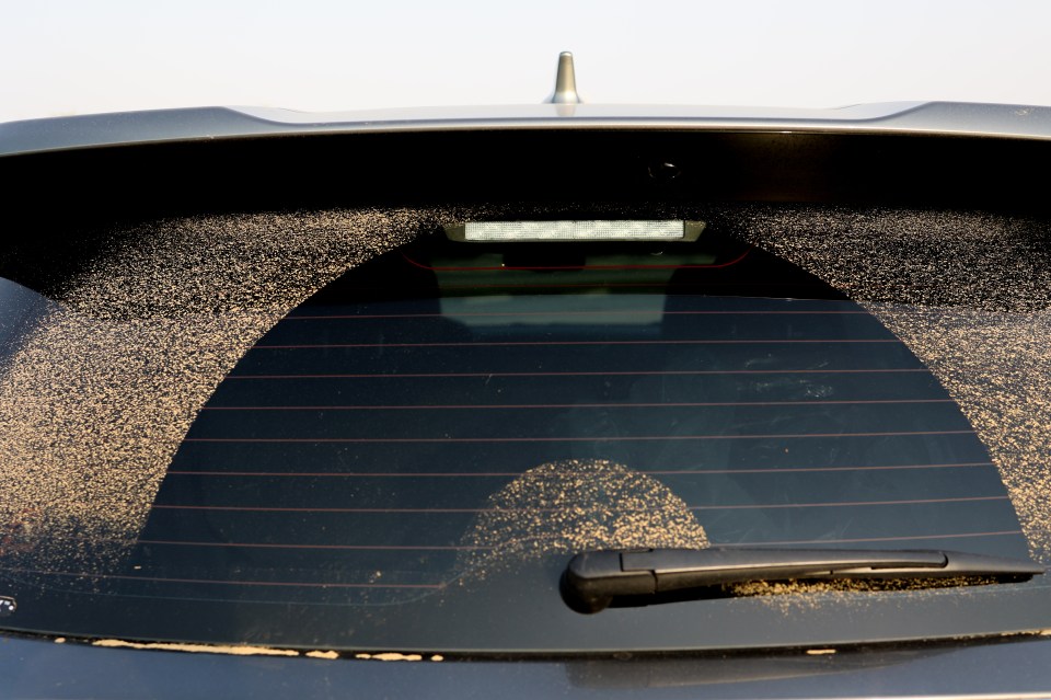 Drivers were baffled after discovering their cars covered in dust and dirt amid 30C sunshine