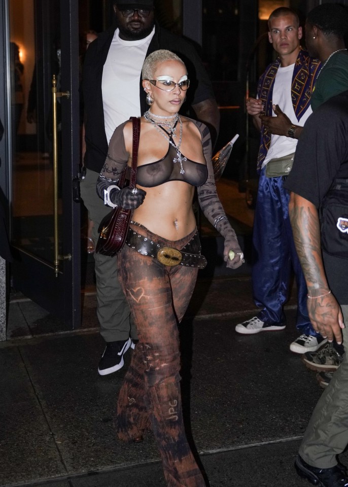 Onlookers didn’t know where to look as Doja Cat marched out of a New York Fashion Week bash in a see-through top and trousers