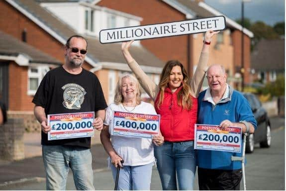 She split a £1million prize with three neighbours on her Lancashire street