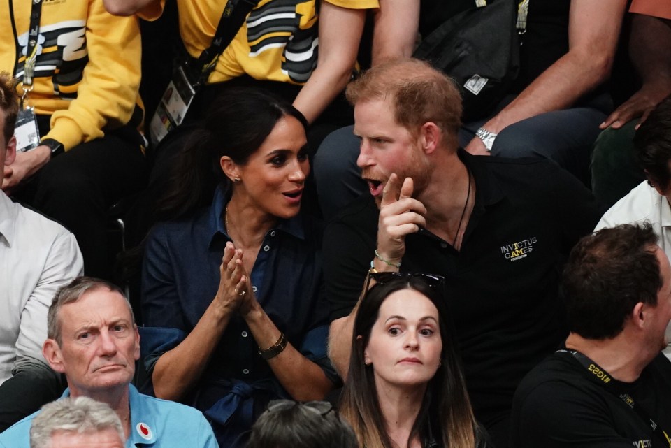 The pair looked to be getting into the spirit of the games on Friday