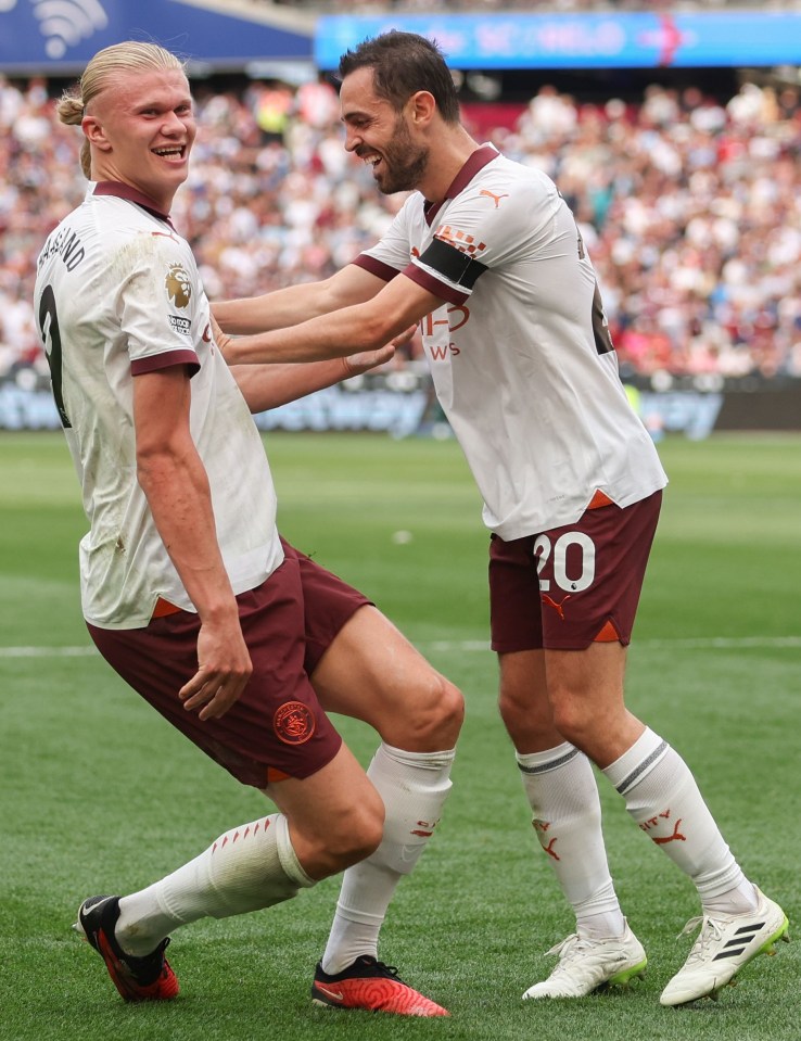 Bernardo Silva gives fellow Man City scorer Erling Haaland a push like Paolo Di Canio's on ref Paul Alcock in September 1998