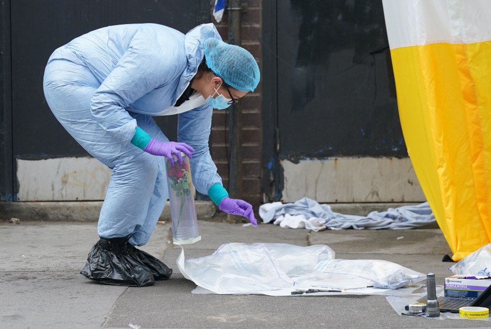 A forensic investigator at the scene yesterday