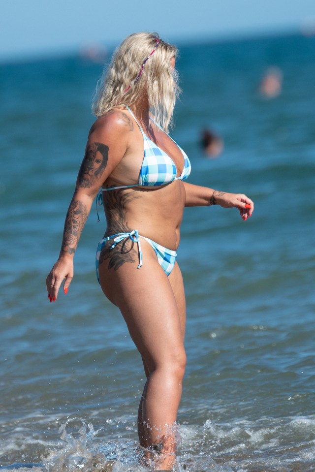 Kerry Katona showed off her incredible figure in a blue gingham bikini on holiday