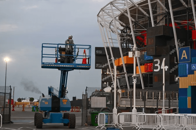 Construction workers moved in soon after Brazil's 4-1 win over South Korea