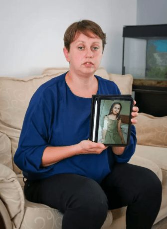 Sara Sharif’s mum Olga with a picture of her daughter