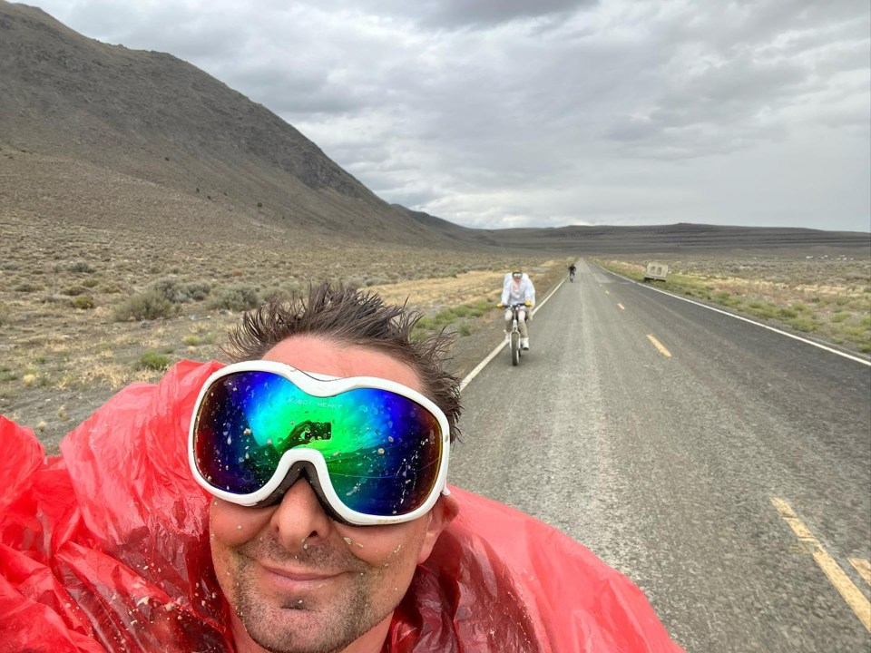 Matt and Elle donned ponchos and glasses to flee the chaos on bikes