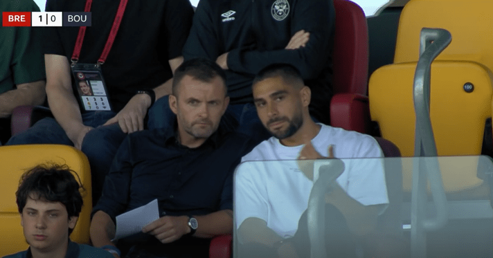 Nathan Jones was seen in conversation with Neal Maupay