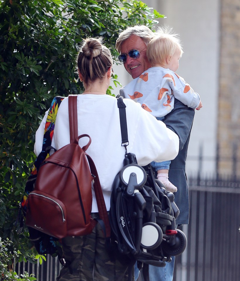 Richard appeared to be the doting grandfather as he gave cuddles with his granddaughter Bodhi.