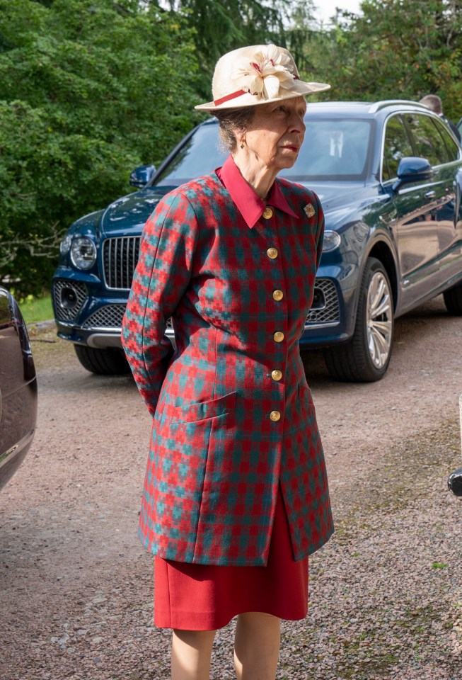 Princess Anne wore a red tartan jacket with gold buttons