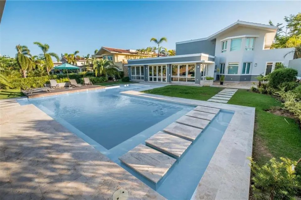 Paul's Puerto Rico mansion boasts a stunning swimming pool