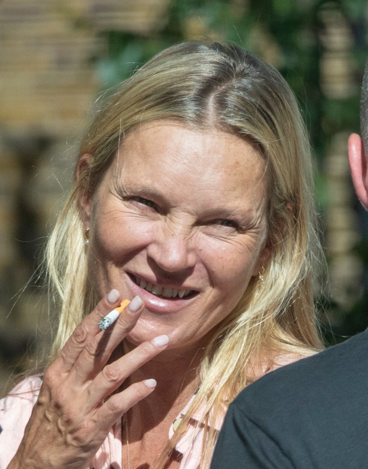 Kate Moss has been pictured smoking weeks after appearing to favour vaping