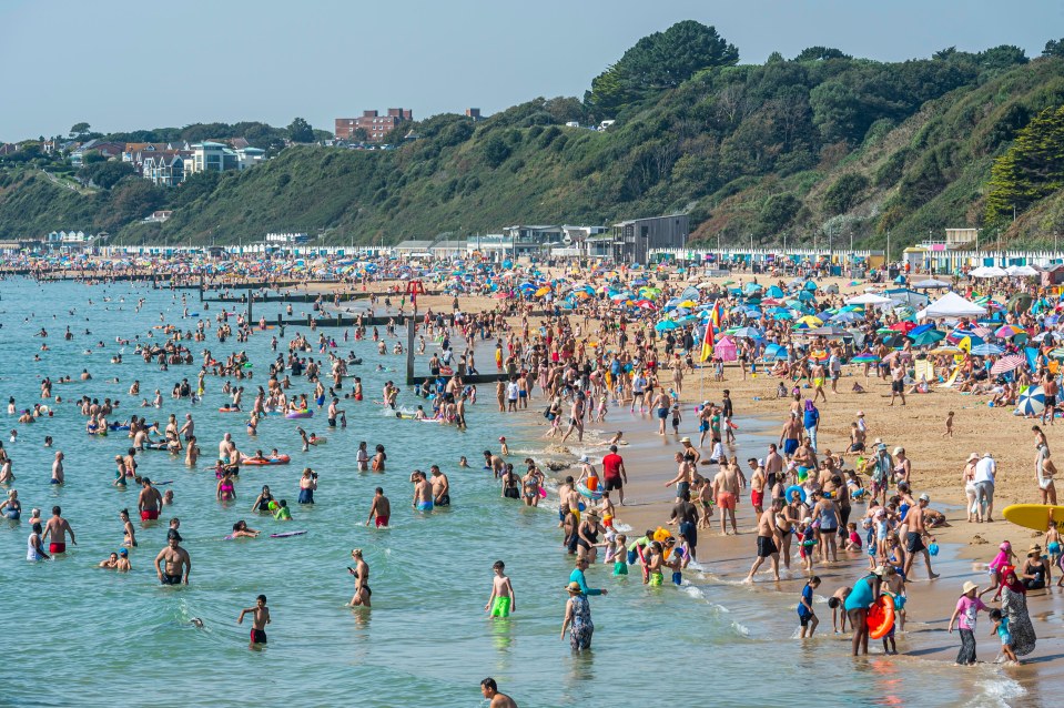 While temperatures towards the end of this month are expected to be above normal they're not expected to be close to the heights of the recent heatwave which saw places like Bournemouth beach, pictured, packed out