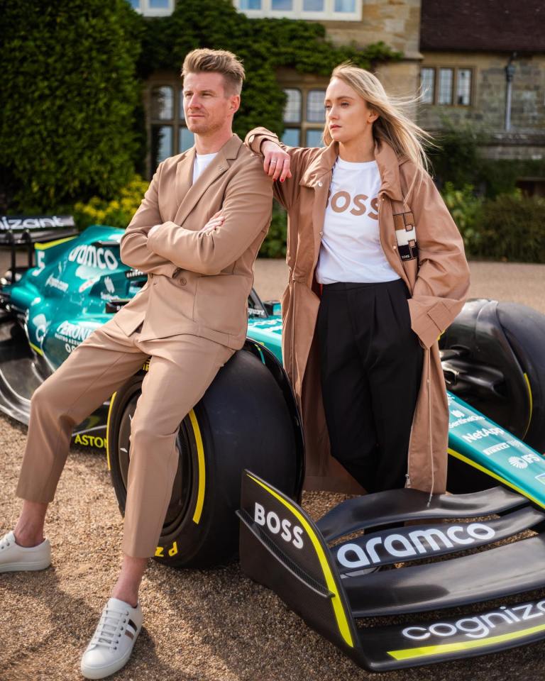 Hawkins, pictured here alongside Haas driver Nico Hulkenberg, is a regular sight around the F1 paddock