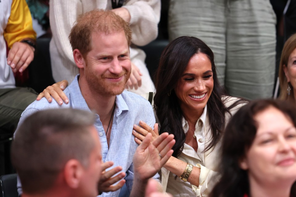 Meghan embraced her husband during his birthday song