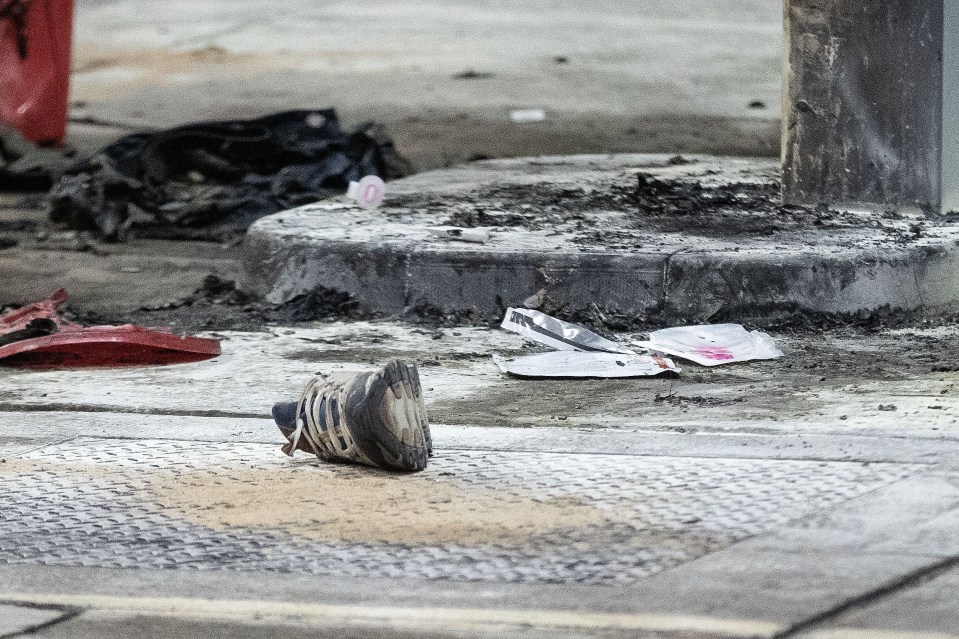 A 'burnt out suitcase' and scorched shoe were spotted at the scene