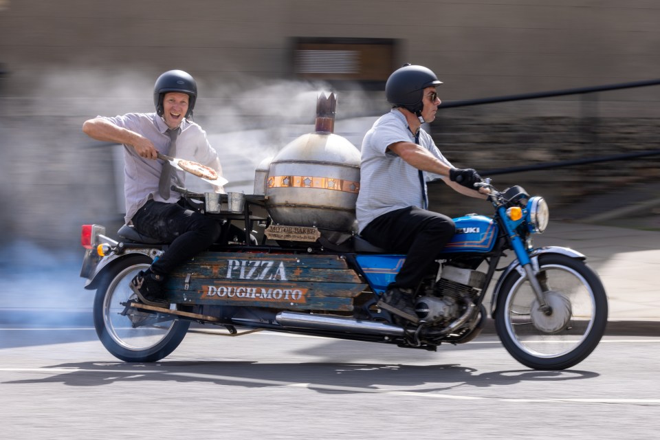 Colin works in the portable 'kitchen' as the rider weaves his way through traffic. His design sees the bike stretched by two metres