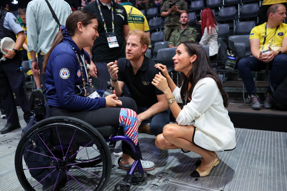 Body language expert Judi James said Meghan Markle touching Prince Harry's shoulder indicate she is 'going to talk and that Harry might need to wait to take his turn'