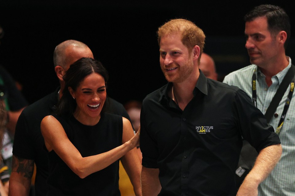 They laughed together and they held hands at the event