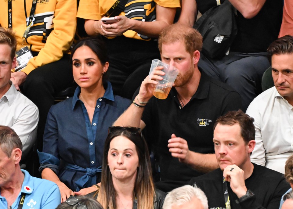 Prince Harry and Meghan Markle knocked back beer at the Invictus Games today