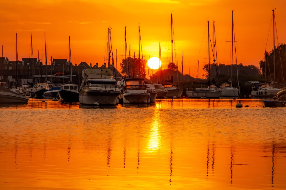 The sun rises over Christchurch, Dorset, yesterday