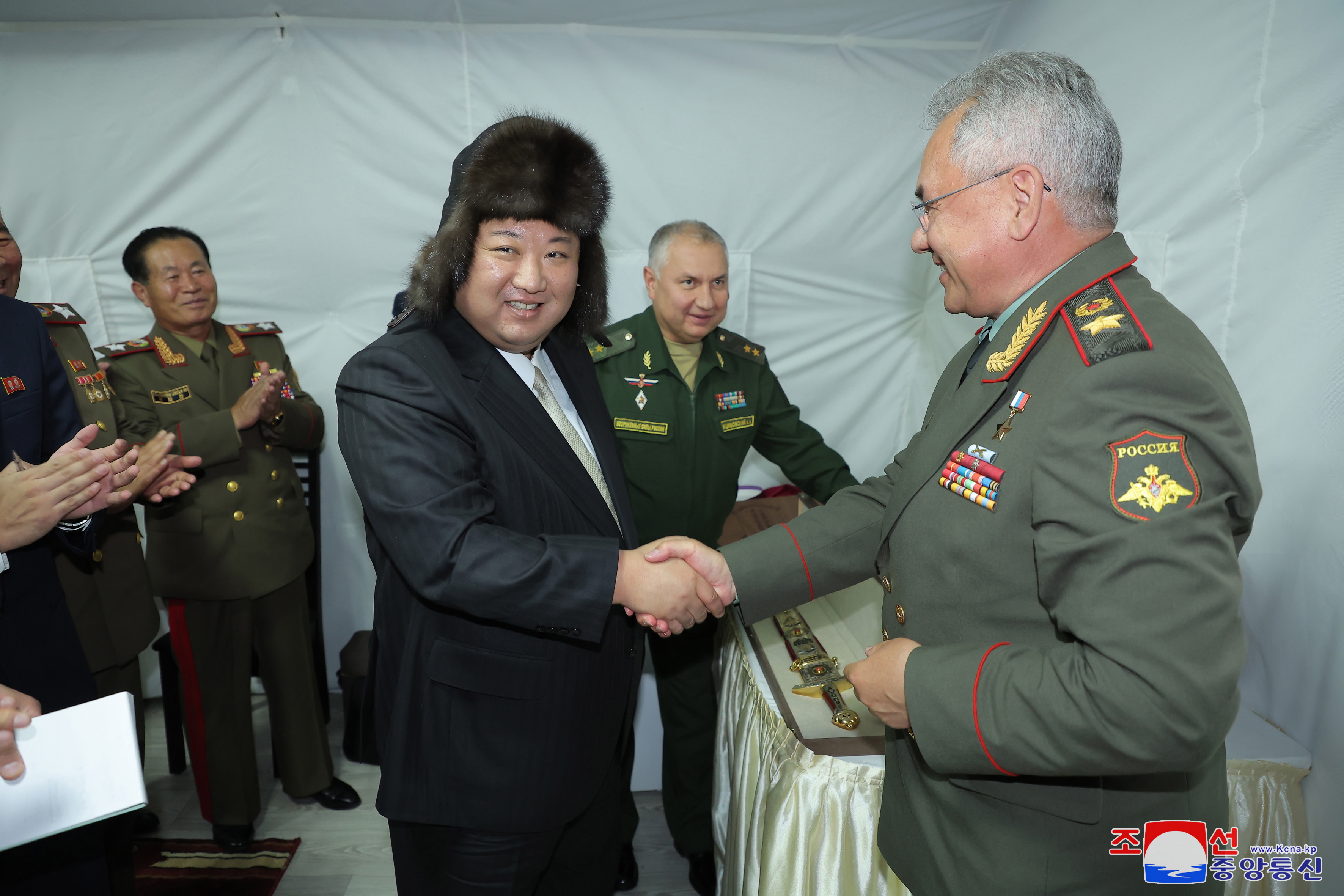 The North Korean leader wearing a furry hat gifted to him during his 'friendship tour' in Russia