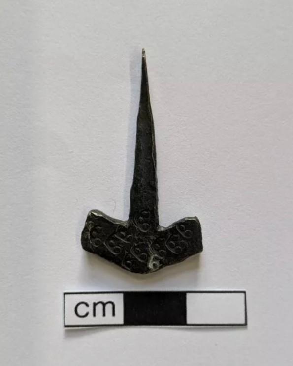 This ancient Norse silver pendant was declared treasure by a coroner after being discovered in Norfolk