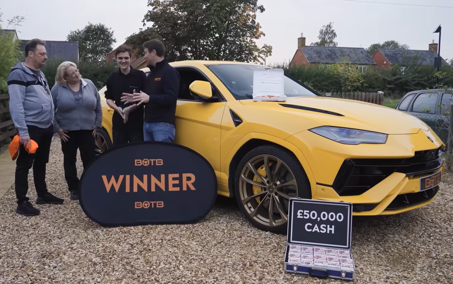 Cory Thackstone (centre left) won a £190,000 Lamborghini just days after his 22nd birthday