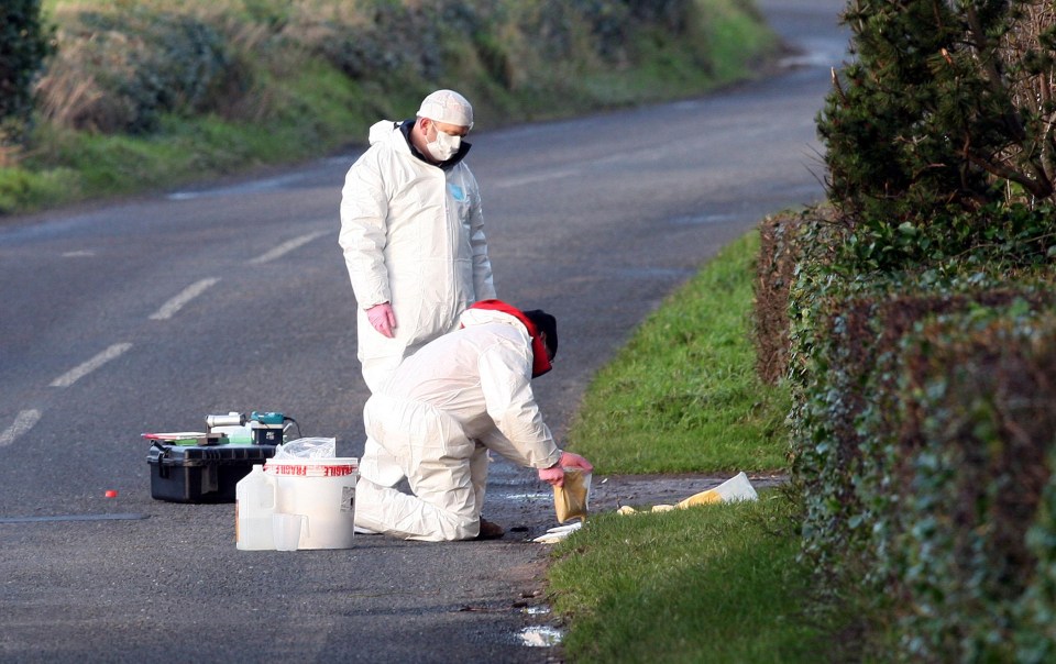 Forensic officers at the scene of the shotgun blasting in 2012