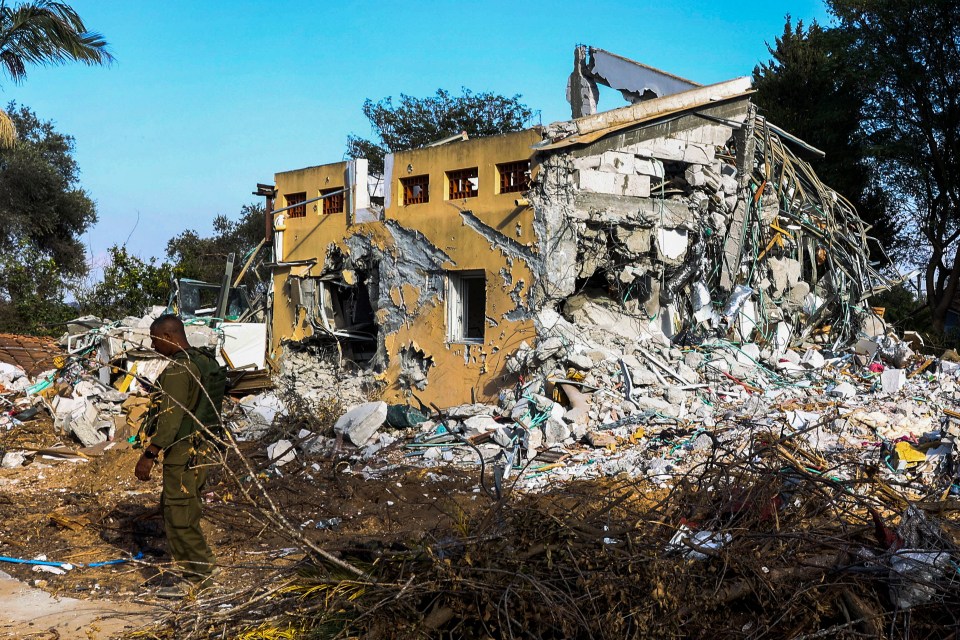 A destroyed house during a guided visit of the media to the destroyed Be'eri Kibbutz