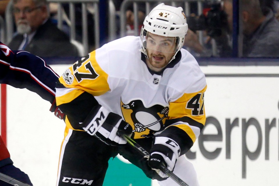 Johnson in action for Pitssburgh Penguins during an NHL hockey game in Columbus, Ohio, in September 2017