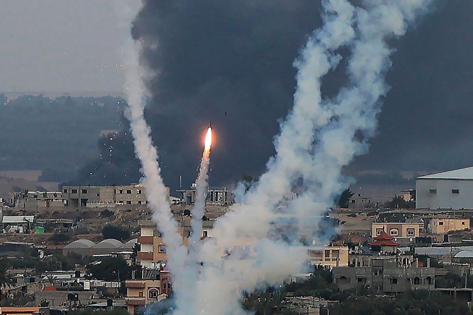 Hamas fire rockets towards Israel from Rafah, southern Gaza Strip