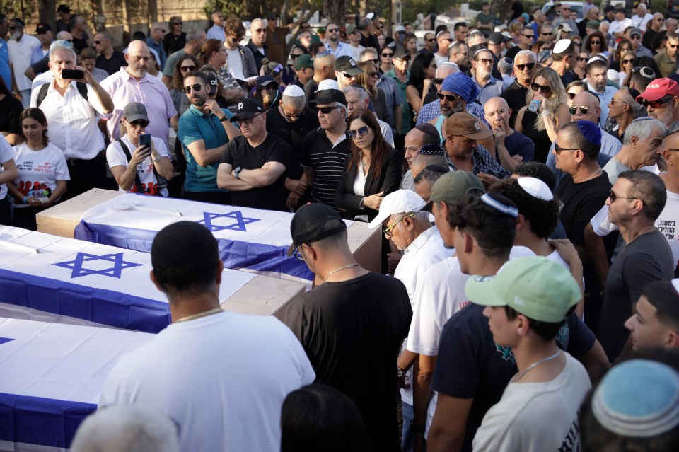 Hundreds of mourners gathered today to honour Brits Lianne Sharabi, 48 and daughters Noiya, 16, and Yahel, 13